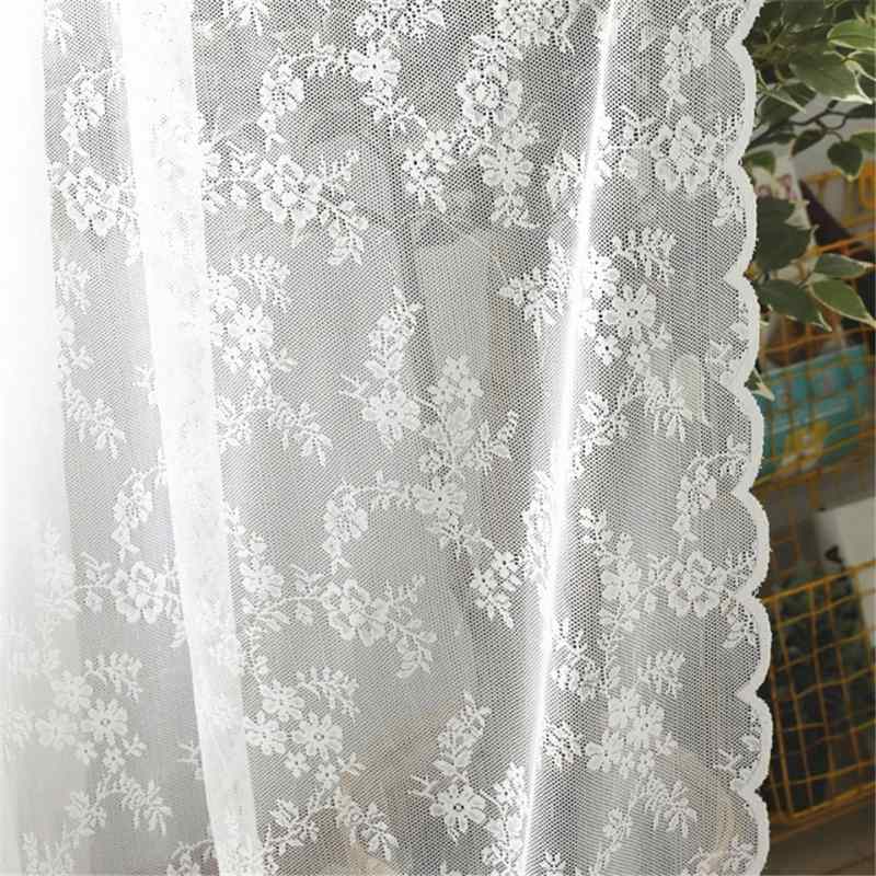 Rideau en dentelle blanche impec.