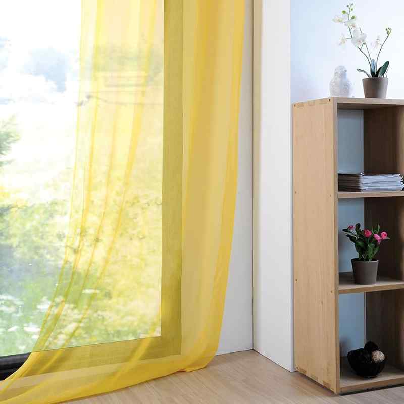 Voilage jaune pour une déco lumineuse
