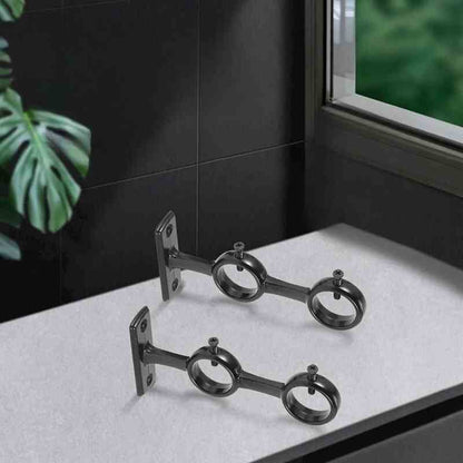 Double support pour tringles à rideaux.